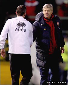 Owen Coyle shakes hands with Arsene Wenger