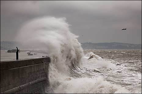 The sea bursts over Brixham's Breakwater