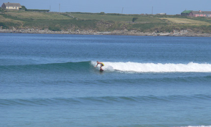 Boardshorts? In Ireland? Just about possible at the dozens of Brandon Bay breaks that get a full 16 C whack from the Gulf Stream. Pic: Ger, July 06