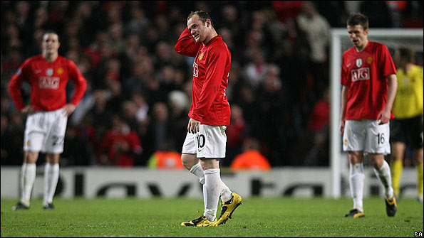 Wayne Rooney shows his disappointment after Porto's late equaliser