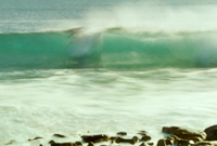 speed blur of surfer taking off - mart