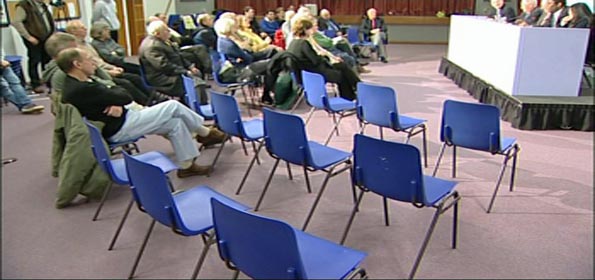 Empty seats at a public debate