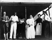 Mohandas and Kasturba Gandhi with others at Tolstoy Farm