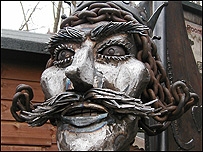 The King's face with large handlebar moustache