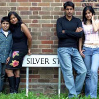 Chauhans with Street Sign