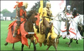 Knights on horseback jousting 