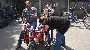 Liz Carr trying to access a bike.