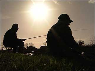Fishermen at sunset