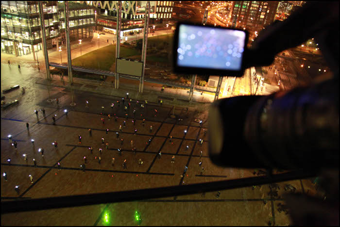 View from the roof of torch-wielding volunteers 