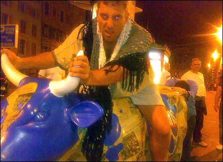 Drunk man on an ornamental cow, Marseille