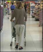 Woman pushing trolley