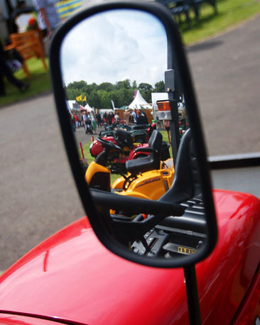 Mini tractors on display.