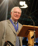 Idris Evans o Houston Tecsas, Arweinydd y Cymry tramor 