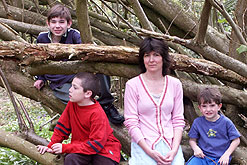 Charlotte Moore and her children (L-R) George (14), Sam (12), and non-autistic Jake (6).