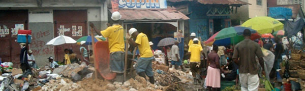 Workers clearing rubble in Haiti