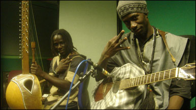 Carlou D (r) with Edouard Manga (r)