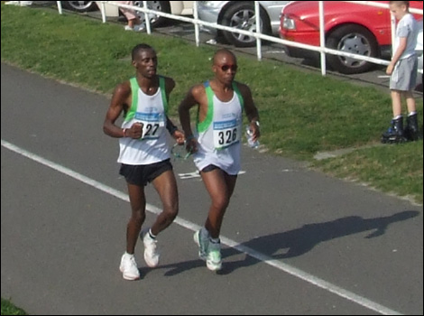 Jersey Marathon runners heading along the Avenue