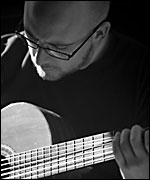 Toby playing the guitar