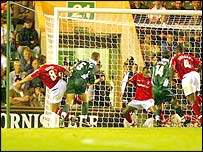 Plymouth Argyle's Graham Coughlan heads home