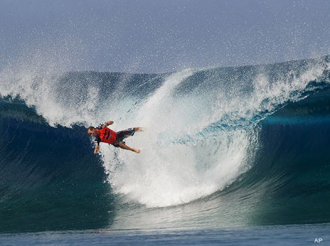 CJ Hobgood in action at the Billabong Pro Tahiti surfing competition in Tahiti.