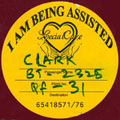 The label placed on Laurence Clark at Changi Airport, saying 'I am being assisted with special care'