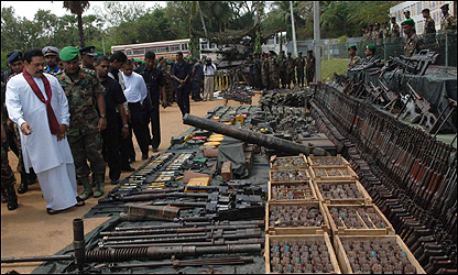 President Mahinda Rajapaksa inspecting weapons captured from the Tamil Tigers (file photo)