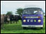 Campervan in field of cows