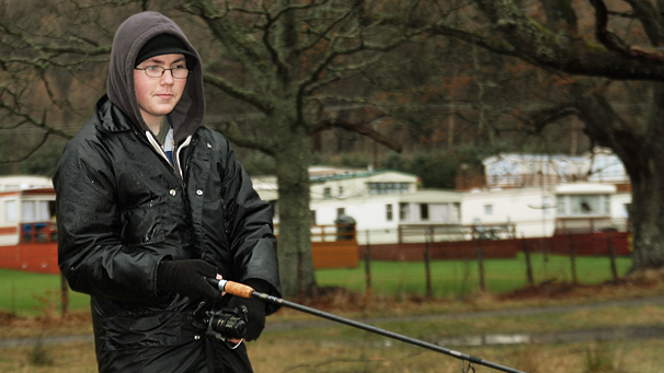 young man fishing