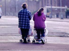 mothers pushing forward-facing pushchairs