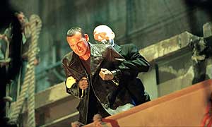 Doctor Who (Christopher Eccleston) battles an Auton