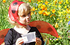 Five-year-old Holly, dressed as a ladybird