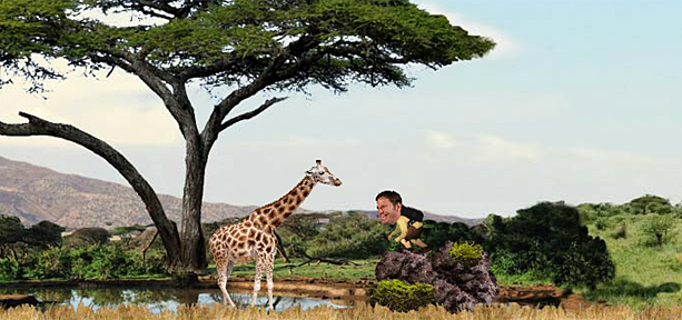 Image from Deadly Planet game of Steve Backshall face to face with a giraffe in Tanzania