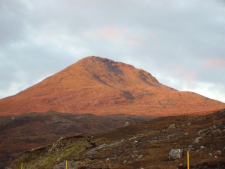 sunrise strikes the harris peaks into flame