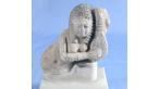 Limestone figurine of girl