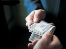 Money changing hands