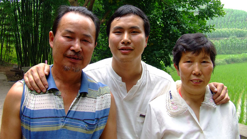 Liu Hong Liang visiting his family on their farm.