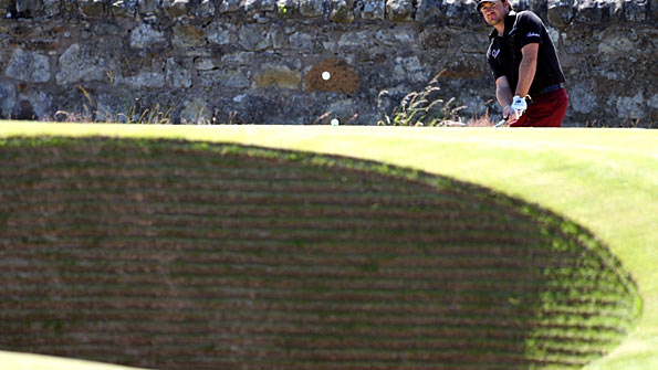 US Open champion Graeme McDowell practises at the 17th hole at St Andrews