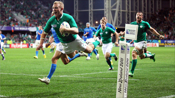 Keith Earls dives over to score for Ireland in their win over Italy