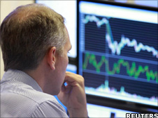 Trader looks at his screen