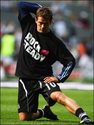 Michael Owen warms up