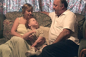 Two-year-old Lamar has been cared for by Phil and Elizabeth since he was six months old. Lamar has spina bifida, but nothing stops him from exploring his world and learning to take his DETERMINED.