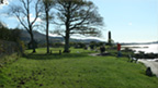Colour view of coastal path leading to Battle of Largs Monument.