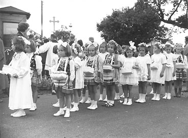 Polish children line up at one of the religious festivals at the camp, circa 1960.
