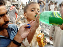 بالاکوٹ میں ملبے سے نکالے جاناے والے بچہ