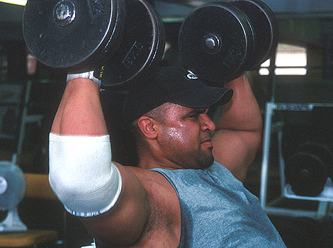 Man lifting weights at the gym