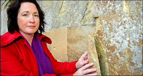 Property Manager Amanda Beard with crumbling stone