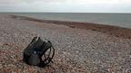 A rucksack on a beach