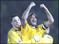 Burton celebrating after the Man U match.