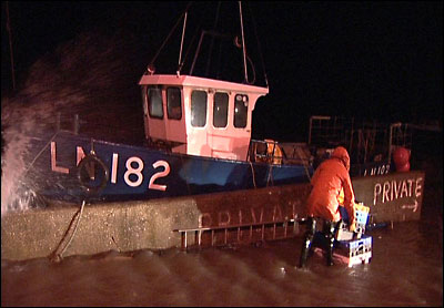 Spring tides lash fishing boats in Wells