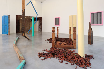 Sheela Gowda, Of All People, 2011. Wood, metal, Print on paper. Installation, variable dimension